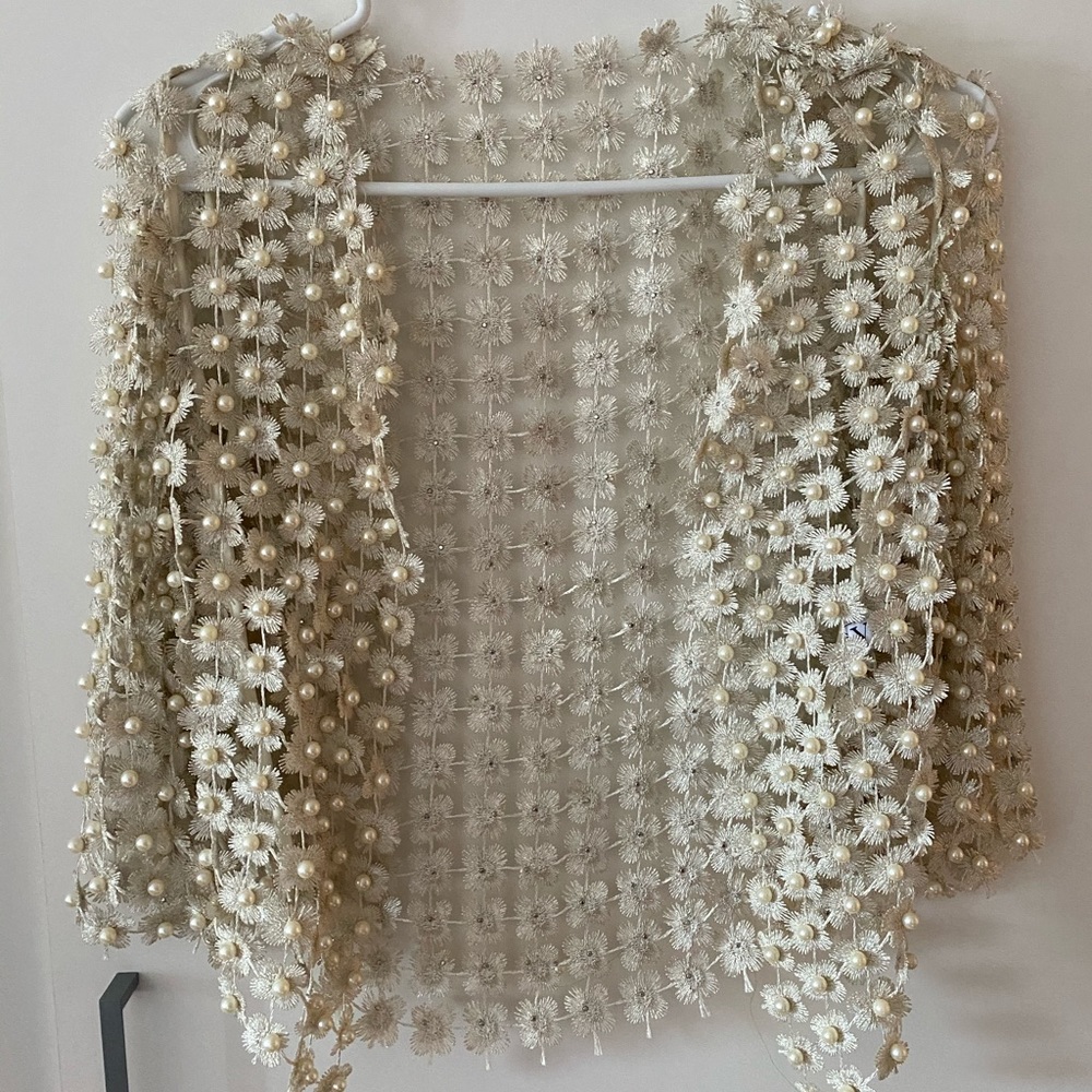 Jacket with beads